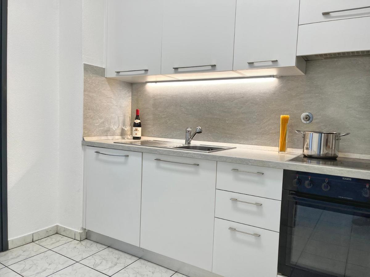 Guesthouse Lugano Apartments By Lr エクステリア 写真
